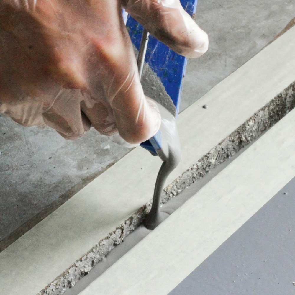Product afbeelding: Vloerreparatie voor betonvloeren, plamuur, 25 kg, grijs